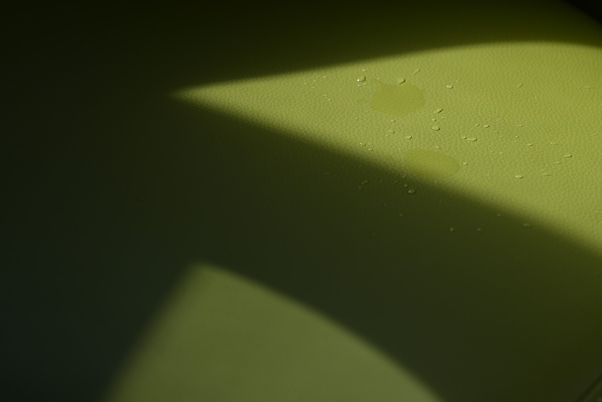 Water drops on green vinyl