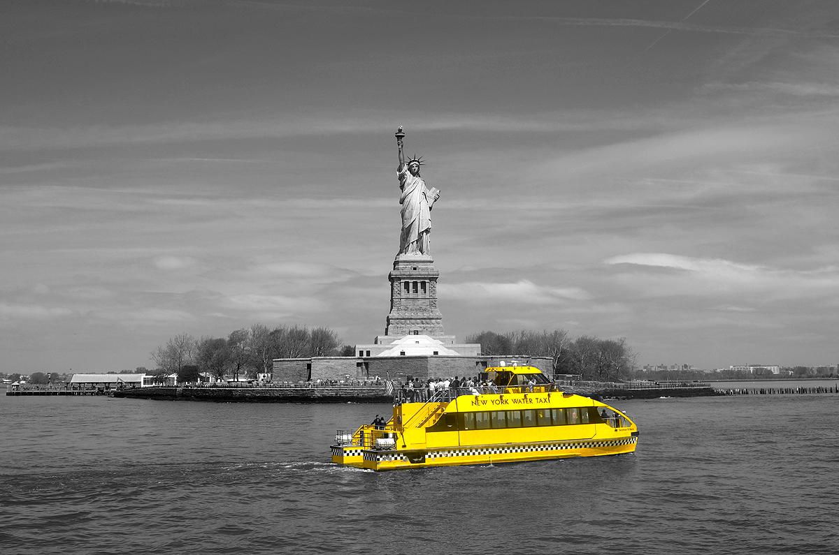 The Statue of Liberty Hailing a Water Taxi :)