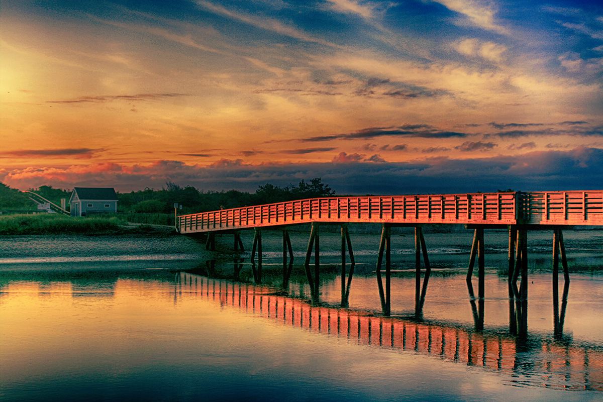 Sunrise over footbridge