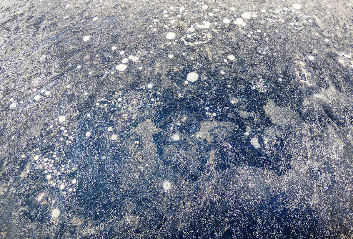 Icy Terrain of a Car Roof