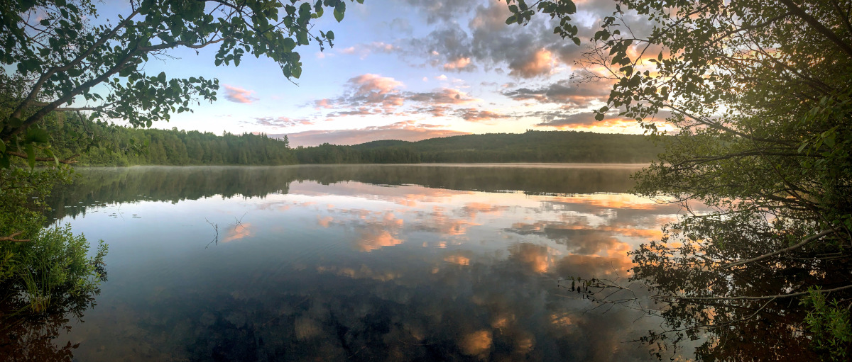 Serene Sunset Over a Lake in Quebec, Canada