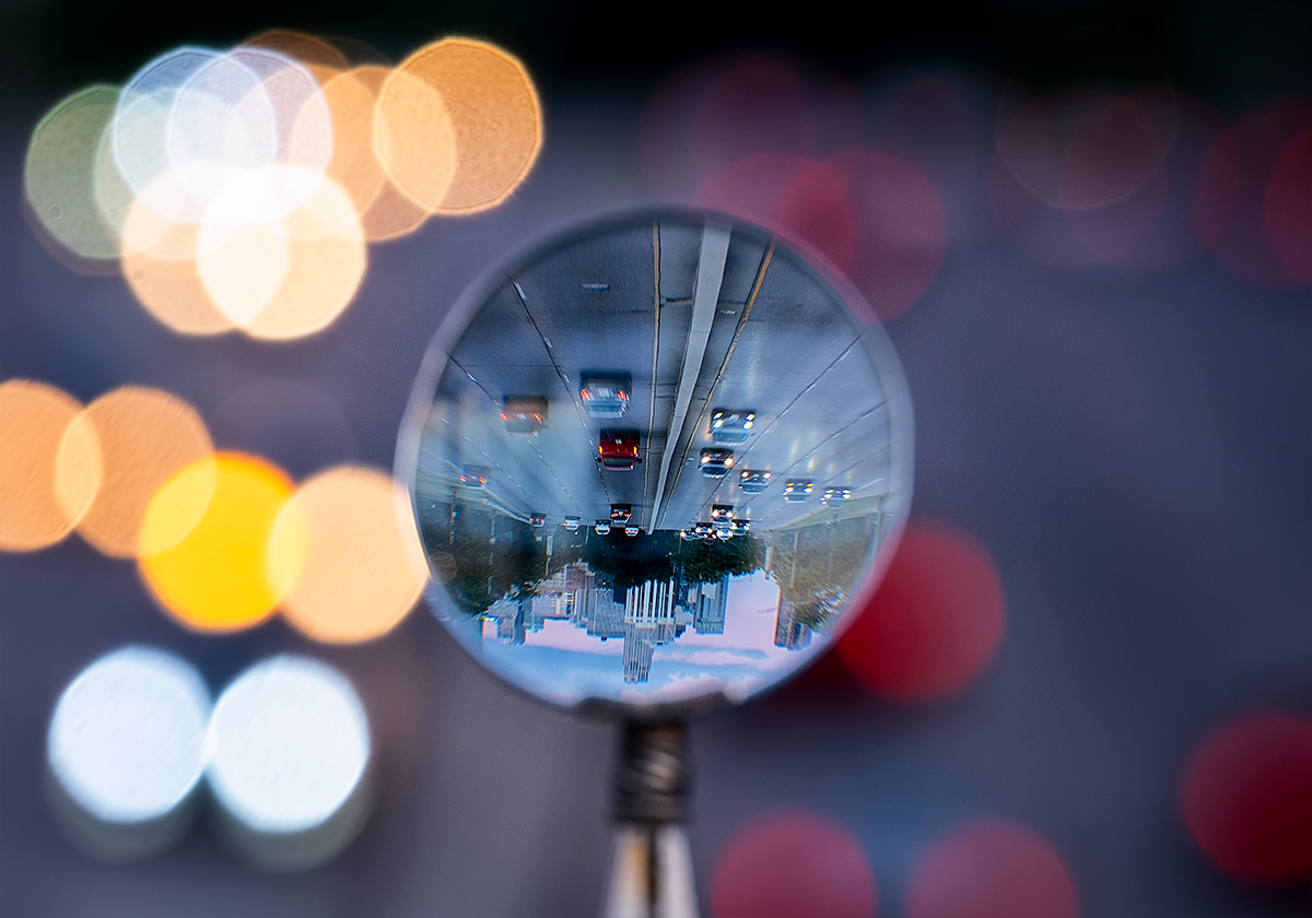 Magnifying glass over traffic
