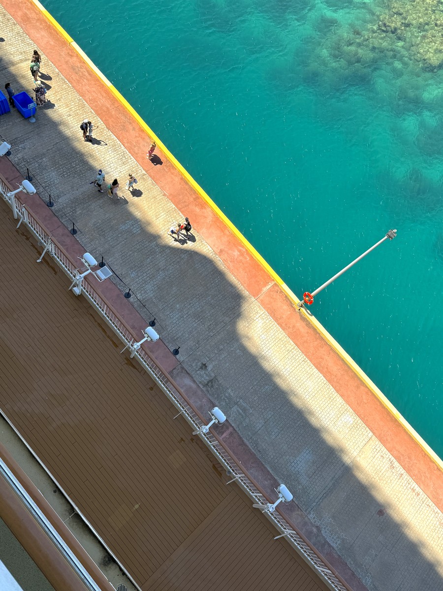 Pier. Ocean. Tiny People. 