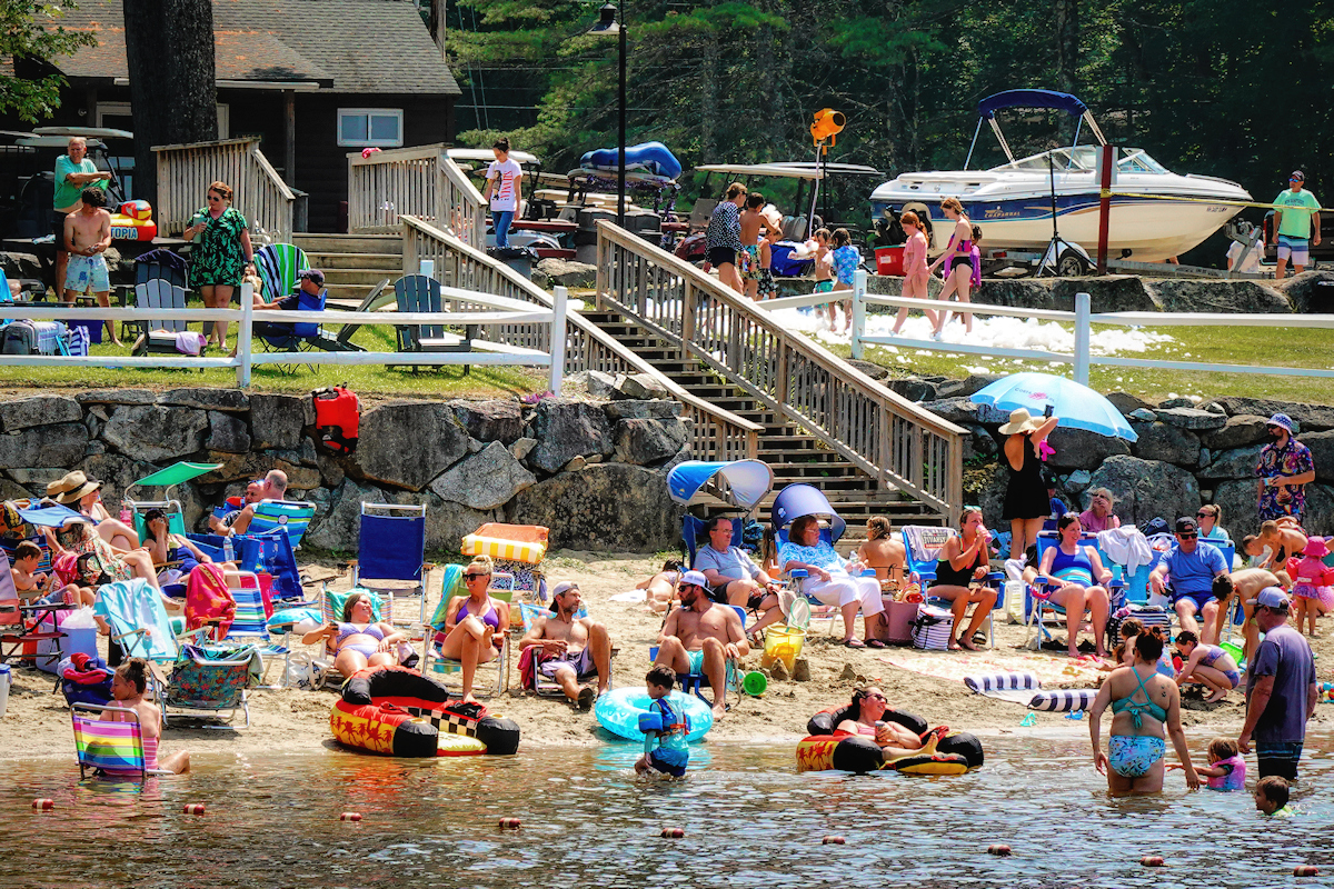 Local community celebrates beach being declared safe to reopen.