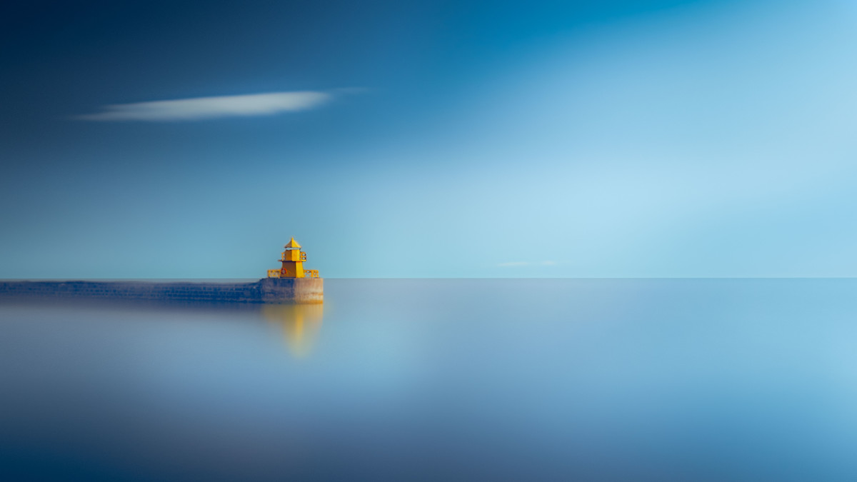 Light House at Calm Sunrise