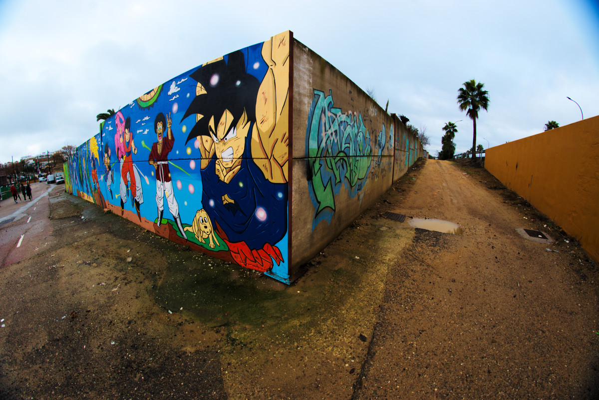 Corner of a lonely street full of graffiti