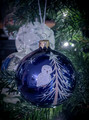 painting a new christmas tree ornament every year 
