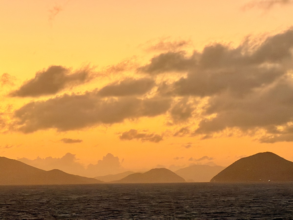 Sunset, Mountains, and Sea