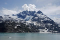 Clioud Puffs atop Peaks in College Fjord