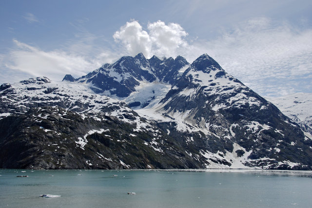 Clioud Puffs atop Peaks in College Fjord