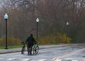 man with two bikes after the rain