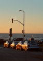Sunset sea of cars at seaside