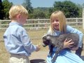 katie&michaelfeedinggoat.JPG