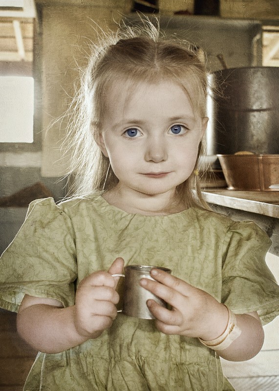 CHILD WITH CUP