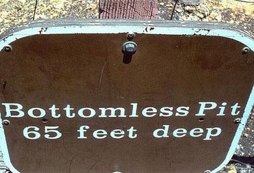 bottomless-pit-65-feet-deep-funny-sign