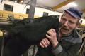 Farmer and cow