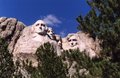 Mount Rushmore framed by trees