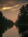 Sun Sinking into the River