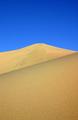 blue sky, yellow dunes