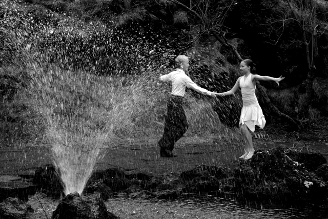 Dancing behind the fountain...!