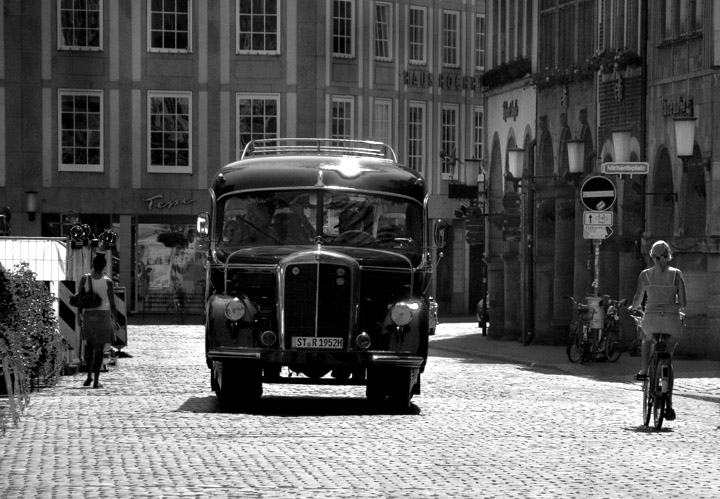 Red bus in b/w