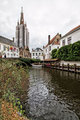 Canal and scaffolded church