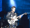 Chris Issak in disco suit