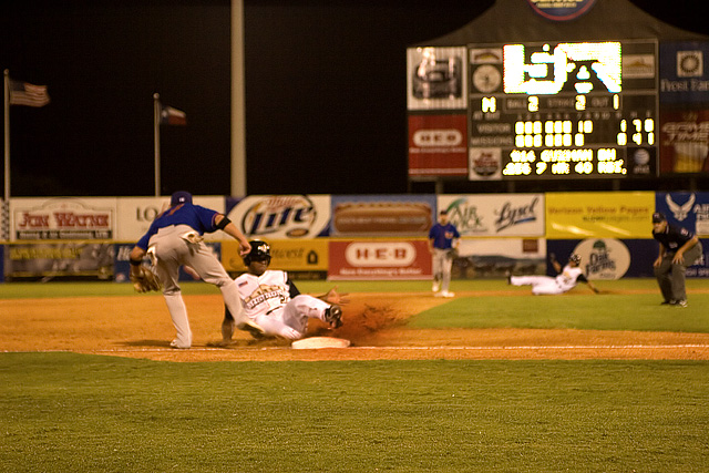 Baseball safe at 3rd and 2nd slide