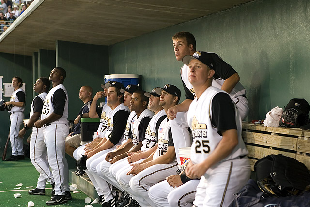 Missions Team in Dugout watching-SMALL-0285.jpg