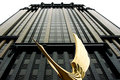 Golden bird and building