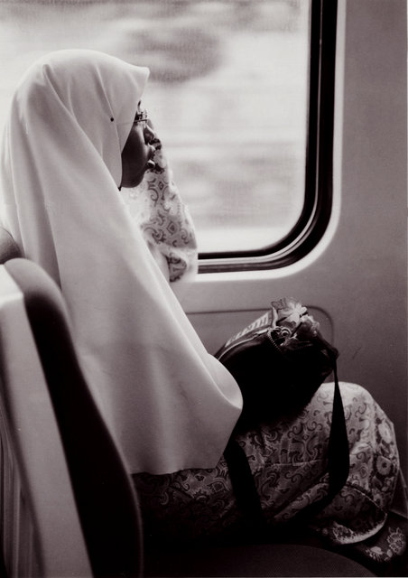 Girl on train Malaysia.jpg