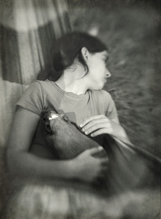 tessa holding nellie in the hammock 