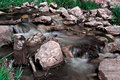 Stream Flowing Around Rocks