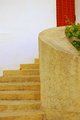 Stairway to red door