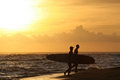 sunset surfing