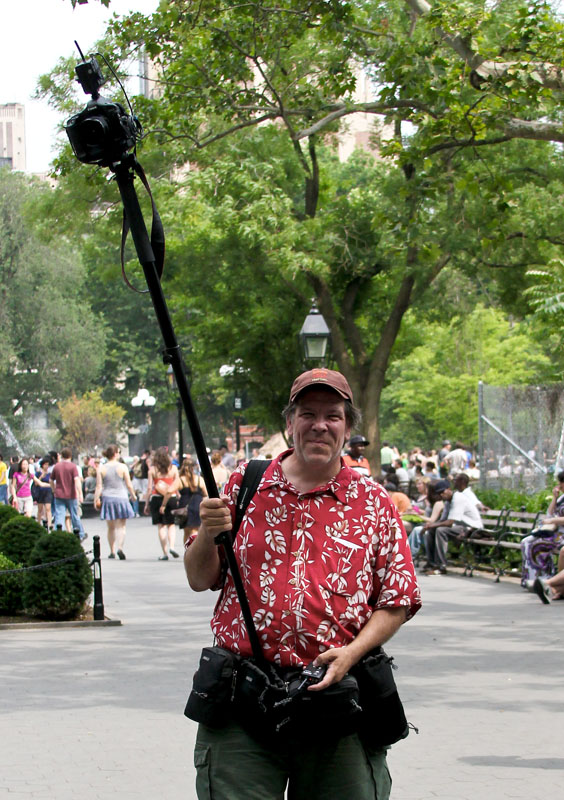 Beware of man with long pole
