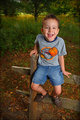 Happy Boy on Fence