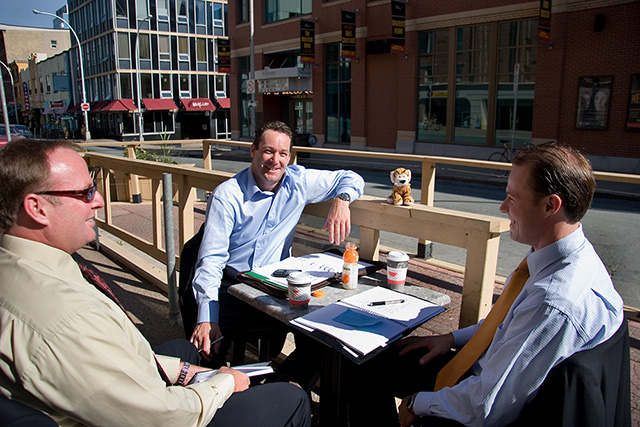 Perry in a business meeting