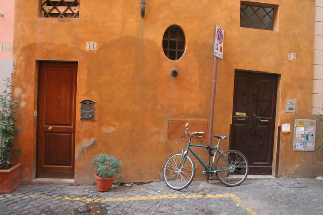 Bicycle and Orange Wall
