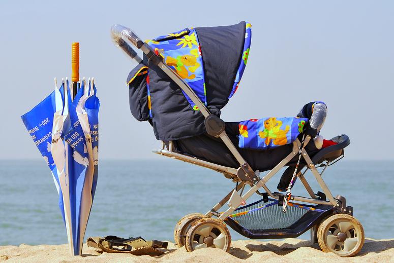 Umbrella and Stroller on the Beach