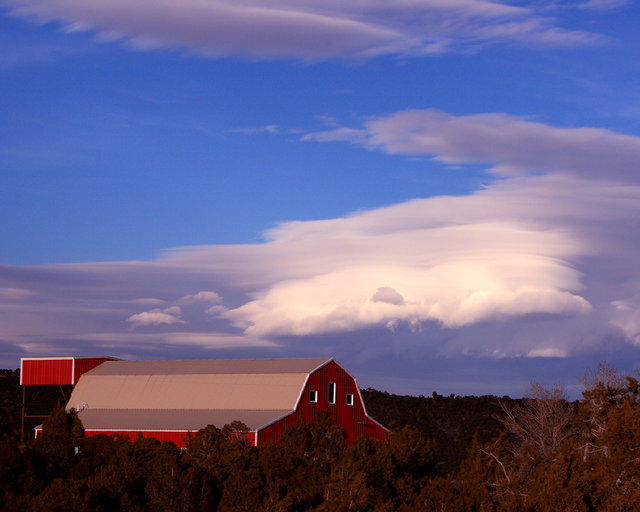 barn in a sea of pinon