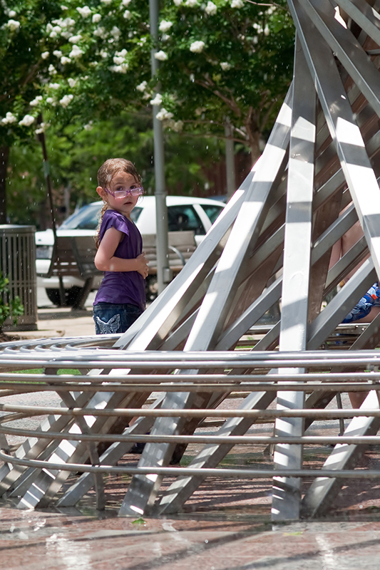 Iola in fountain at Discovery Green