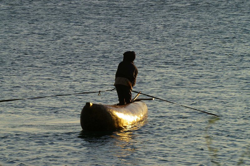 Malawi - roping fishing nets early in the morning