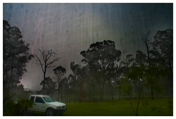 DAY 26. where i live. lightning from my bedroom window.