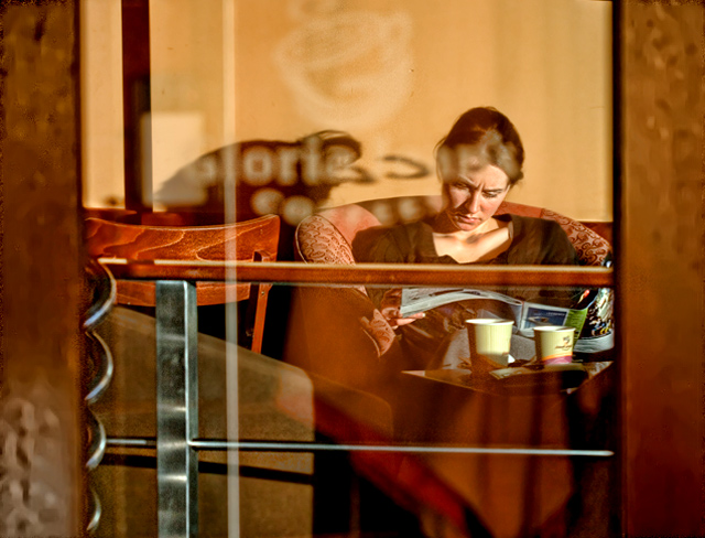 reflection in a cafe door 