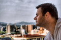 Man looking at city
