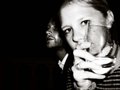 Hiding behind a glass of champagne- Deauville Film Festival - 2006