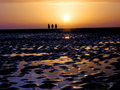Three Figures on the Beach