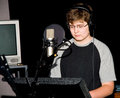 Caleb in the sound booth