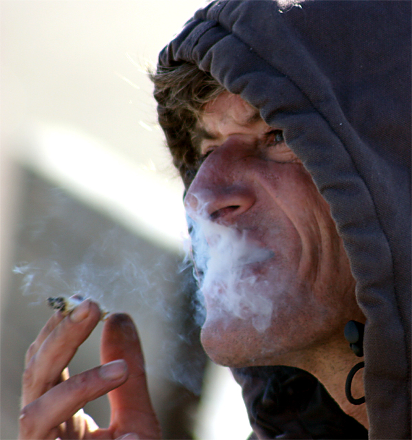 smoke in his face